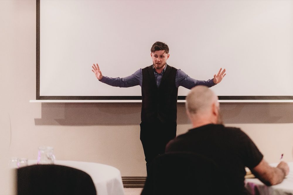 Lewis Hunter presenting at a property and business networking event