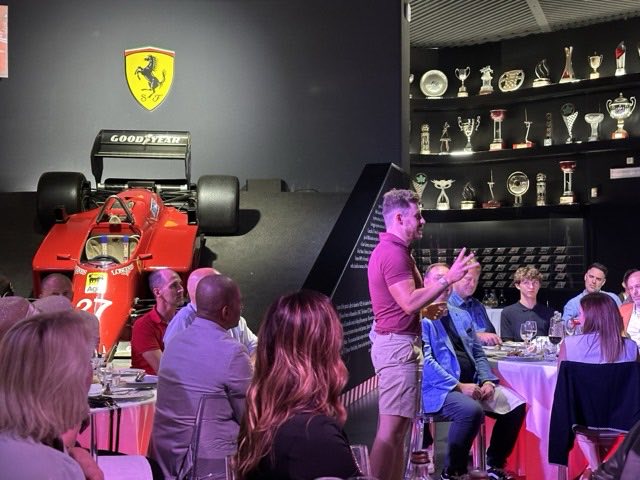 Lewis Hunter speaking to an audience at the Ferrari Museum
